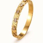 Regal Emerald Crystal Engraved Gold Bangle